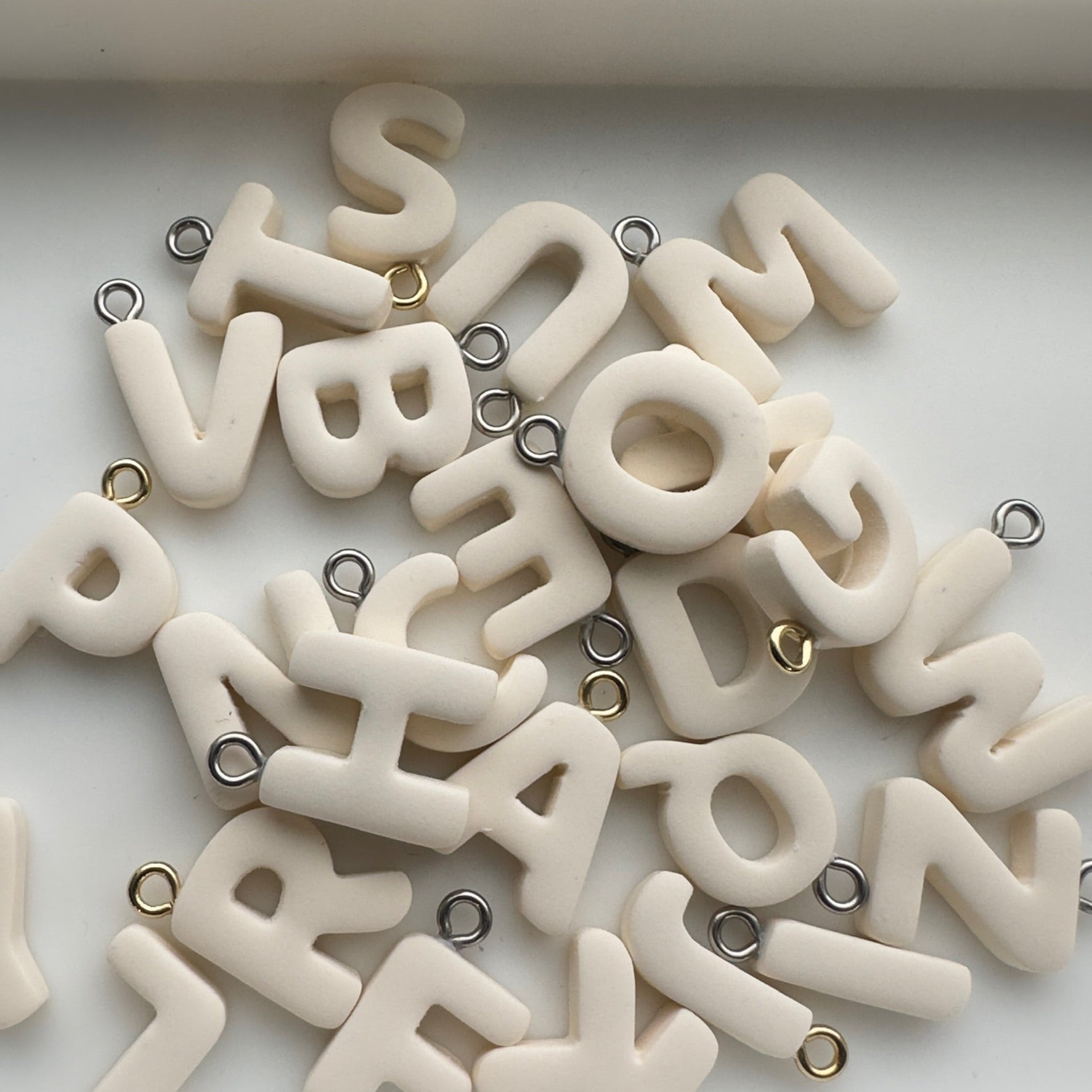 Cream Cutout Initial Charms
