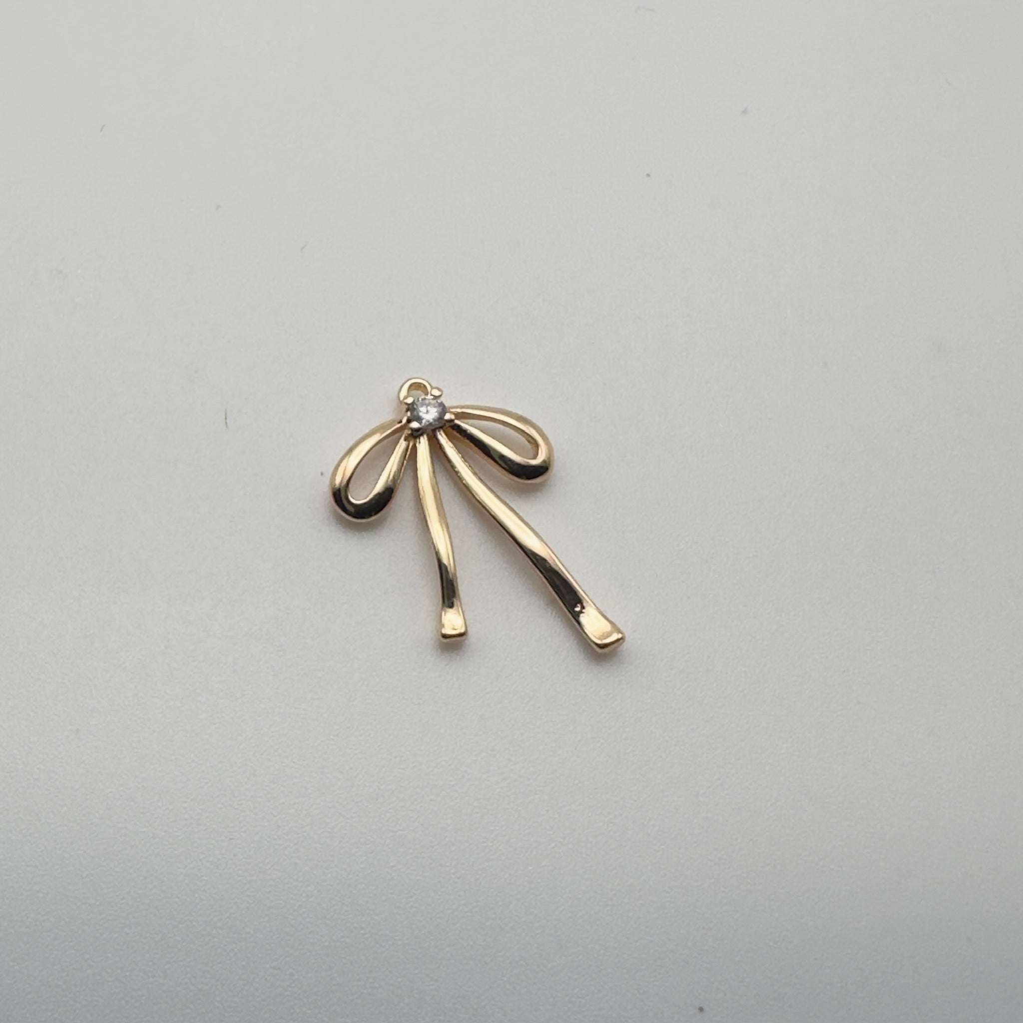 Bow With Cubic Zirconia Charm