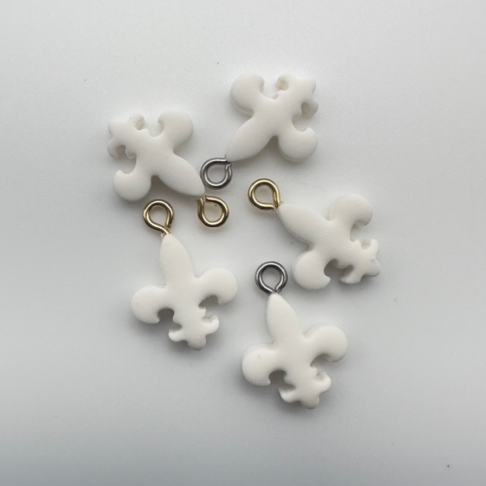 Fiercely Refined Fleur-de-Lis Charm